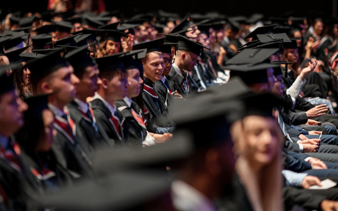 Rows of students in a graduation ceremony